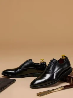 Chaussures habillées pour hommes en cuir à bout pointu à lacets et à talons bas derbies