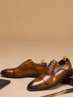 Chaussures habillées pour hommes en cuir à bout pointu à lacets et à talons bas derbies