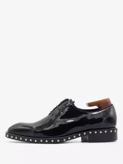 Chaussures habillées pour hommes à la mode à bout rond et rivets en cuir de vache