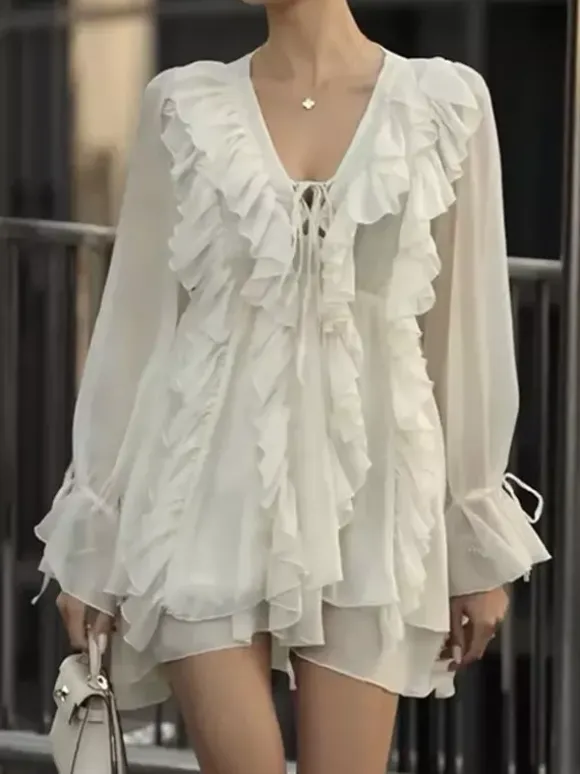 Chemise blanche à volants pour femme col en V manches longues élégantes