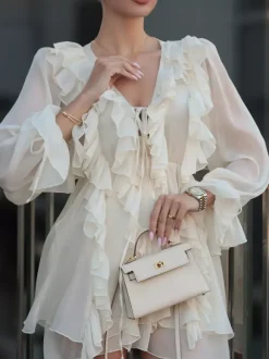 Chemise blanche à volants pour femme col en V manches longues élégantes