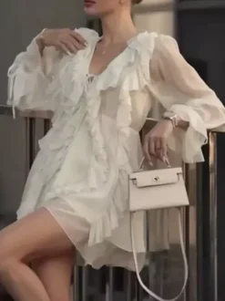 Chemise blanche à volants pour femme col en V manches longues élégantes