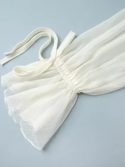 Chemise blanche à volants pour femme col en V manches longues élégantes