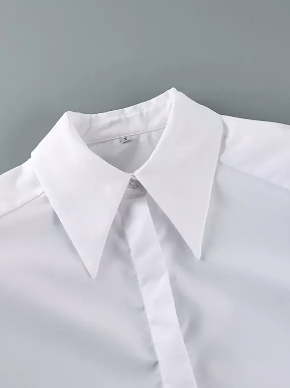Chemise habillée à manches longues col pointu oversize et poignets larges