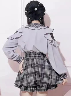 Chemise Lolita en dentelle col rond volants manches longues ruban décoré