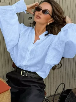 Chemise oversize à manches bouffantes texturées et col montant boutonné