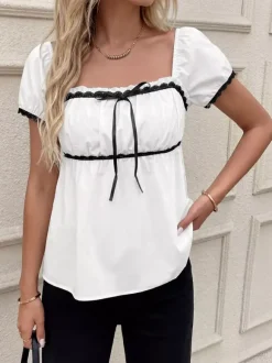 Chemisier péplum à col carré et manches bouffantes noires en dentelle avec n艙ud papillon pour femme