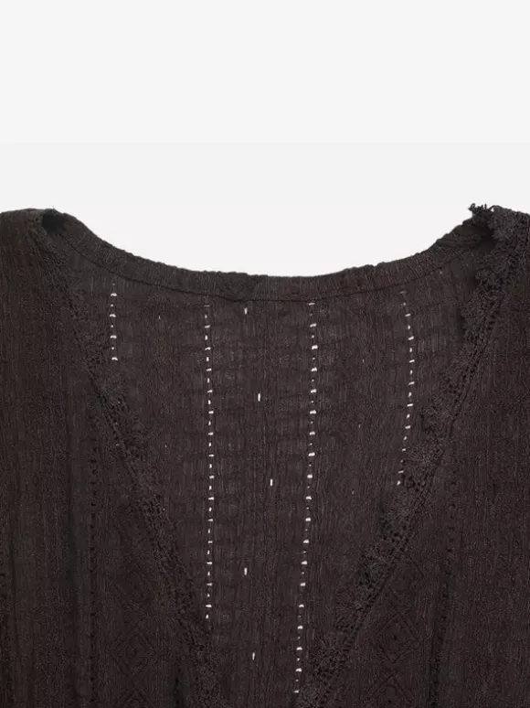 Chemisier texturé à col V dentelle festonnée et volants manches courtes et basque pour femme