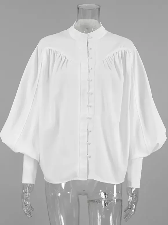 Chemisier vintage à manches bouffantes et col montant pour femme collection automne 2026