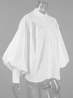 Chemisier vintage à manches bouffantes et col montant pour femme collection automne 2026