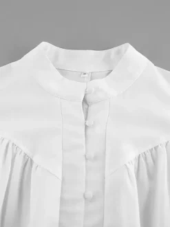 Chemisier vintage à manches bouffantes et col montant pour femme collection automne 2026