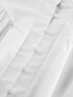 Chemisier vintage à manches bouffantes et col montant pour femme collection automne 2026