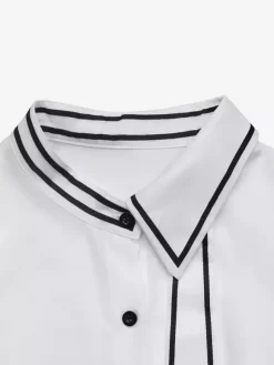 Chemisier péplum à col bordé noir col n艙ud papillon manches longues coupe ajustée