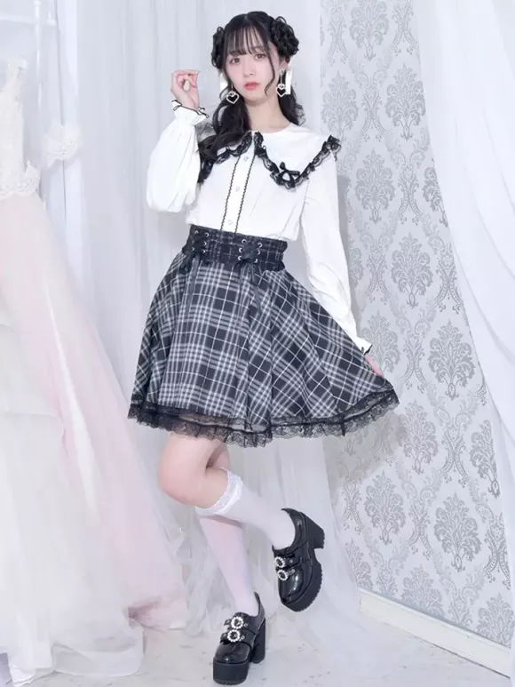 Chemisiers gothiques Lolita haut Lolita blanc à manches longues n艙uds en dentelle chemise Lolita à blocs de couleurs