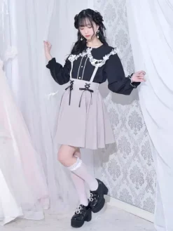 Chemisiers gothiques Lolita haut Lolita blanc à manches longues n艙uds en dentelle chemise Lolita à blocs de couleurs