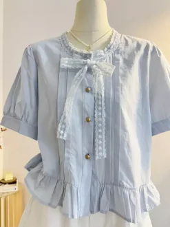 Chemisiers Lolita doux à volants et n艙uds chemisier à manches courtes haut Lolita chemise Lolita bleu ciel clair