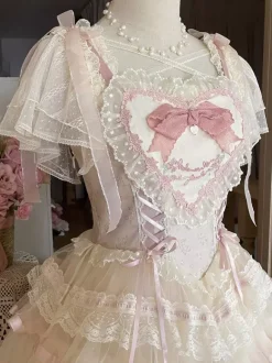Chemisiers Lolita doux haut Lolita blanc à manches courtes n艙uds et volants chemise Lolita