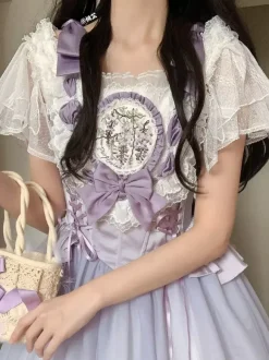 Chemisiers Lolita doux haut Lolita blanc à manches courtes n艙uds et volants chemise Lolita