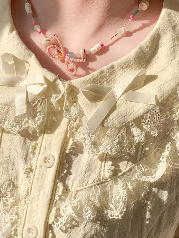 Chemisiers Lolita doux n艙uds en dentelle haut Lolita à manches courtes chemise Lolita noire en dentelle