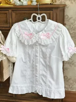Chemisiers Lolita doux haut Lolita rose à manches courtes volants n艙uds chemise Lolita à blocs de couleurs