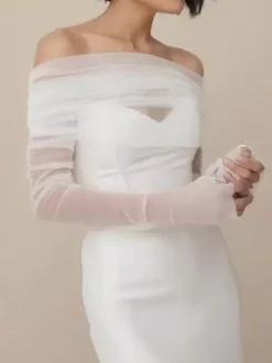 Châles de mariage ivoire à manches longues et col bateau avec boutons en tulle