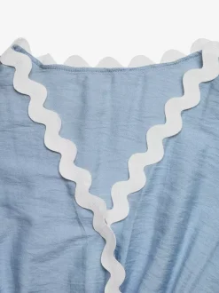 Combinaison bleue à col V manches courtes sans bretelles en viscose coupe droite idéale pour l'été.