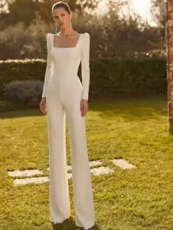 Combinaison de mariée 2 pièces en crêpe stretch avec n艙uds et traîne col carré manches longues taille naturelle couleur ivoire