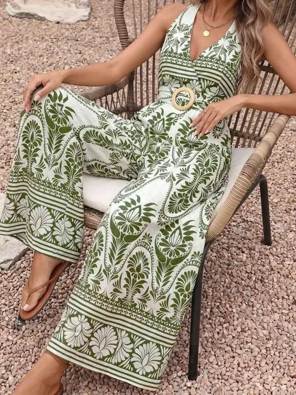 Combinaison dos nu blanche à imprimé bohème vert ceinture à nouer dans le dos avec boucle en bois taille haute jambes larges.