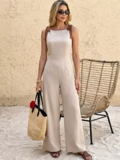 Combinaison pantalon sans manches à taille haute et jambes larges ornée de bordures chocolat contrastées et de liens aux épaules.