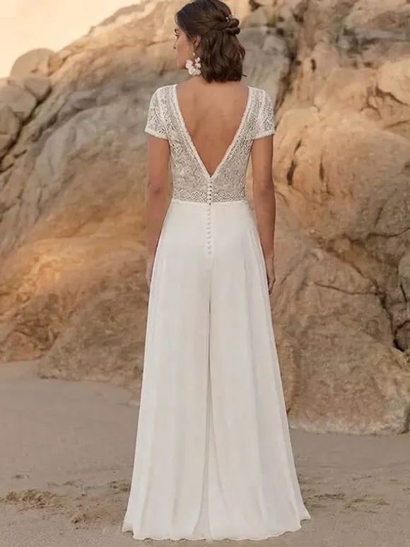 Combinaison de mariée en dentelle combinaison longue en dentelle décolleté travaillé manches courtes taille naturelle couleur ivoire