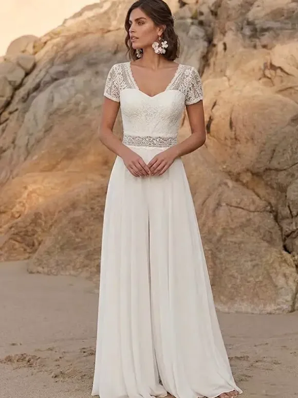 Combinaison de mariée en dentelle combinaison longue en dentelle décolleté travaillé manches courtes taille naturelle couleur ivoire