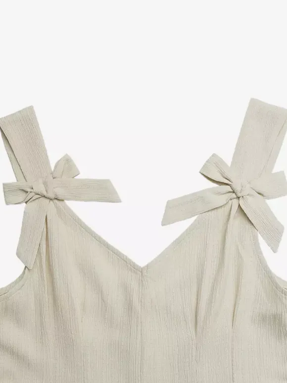 Combinaison de vacances combishort col V bretelles n艙ud papillon plissée taille haute poches plissées