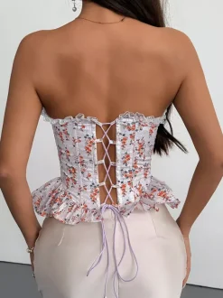 Corsets roses chics sans manches et sans bretelles coupe ajustée en dentelle à lacets