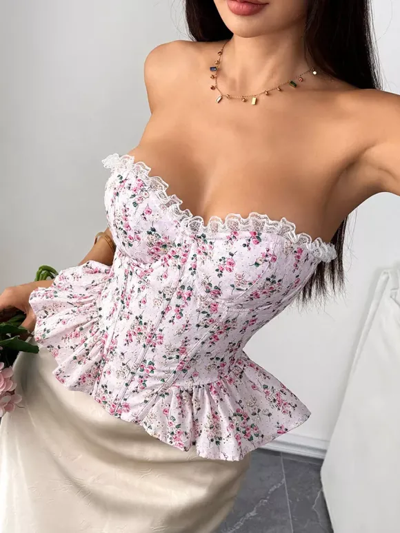 Corsets roses chics sans manches et sans bretelles coupe ajustée en dentelle à lacets