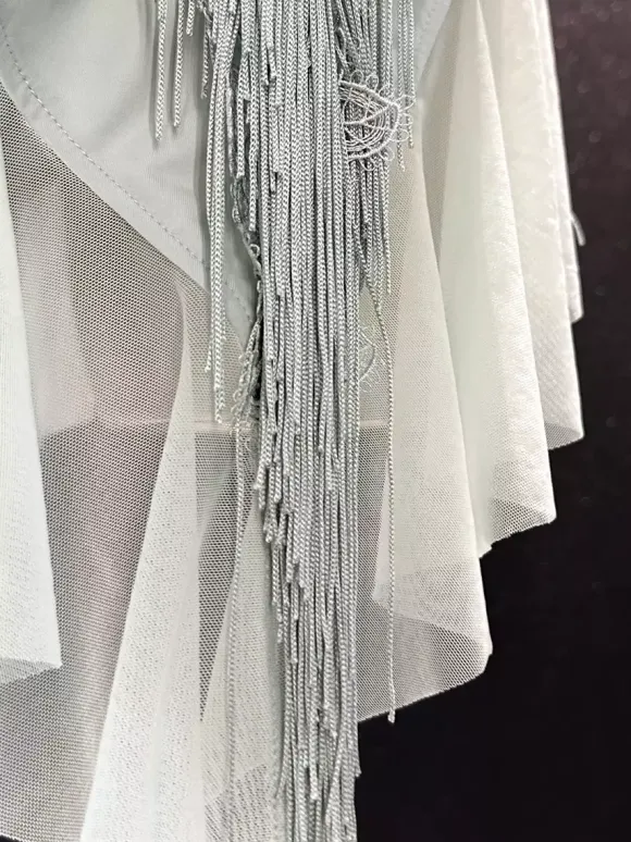 Costume de danse latine bleu pastel pour femme en polyester à franges et dos nu.
