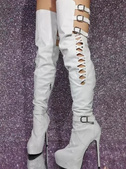 Cuissardes sexy noires à plateforme découpée sur les bottes au genou