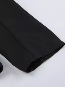 Ensemble blazer et jupe d'inspiration militaire pour femme tenue chic deux pièces - Noir vintage col montant coupe ajustée - Tenue de soirée printemps 2026