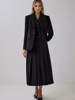 Ensemble de bureau deux pièces pour femme gilet croisé à revers et jupe longue plissée tenue d'été 2026