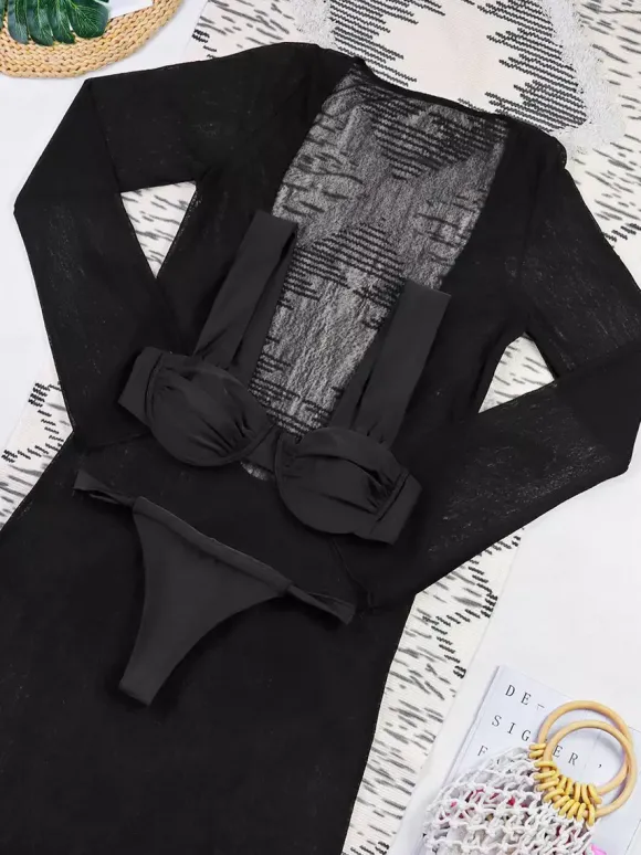 Ensemble de maillot de bain et cache-maillot bleu athlétique à manches longues et dos nageur.