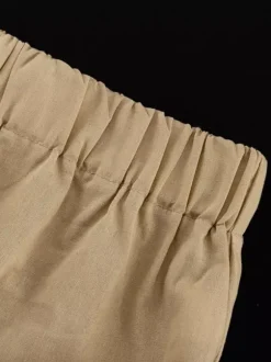 Ensemble deux pièces kaki décontracté streetwear à bretelles et sans manches.
