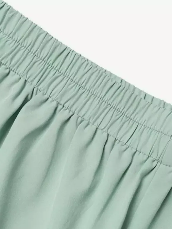 Ensemble deux pièces élégant pour femme : blazer cache-c艙ur tailleur pantalon à jambes larges et coupe ajustée idéal pour le printemps 2026.