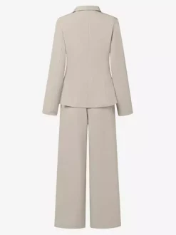 Ensemble deux pièces élégant pour femme : blazer cache-c艙ur tailleur pantalon à jambes larges et coupe ajustée idéal pour le printemps 2026.