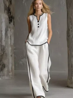 Ensemble deux pièces noir chic bicolore streetwear boutons polyester col rond sans manches