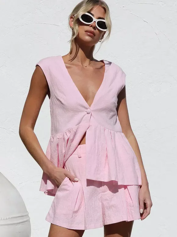 Ensemble deux pièces rose à col V et manches courtes haut et pantalon ensemble d'été