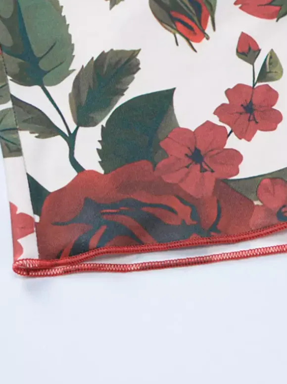 Ensemble deux pièces rouge sexy à imprimé floral tenue de villégiature en polyester à bretelles et col fleuri jupe sans manches.