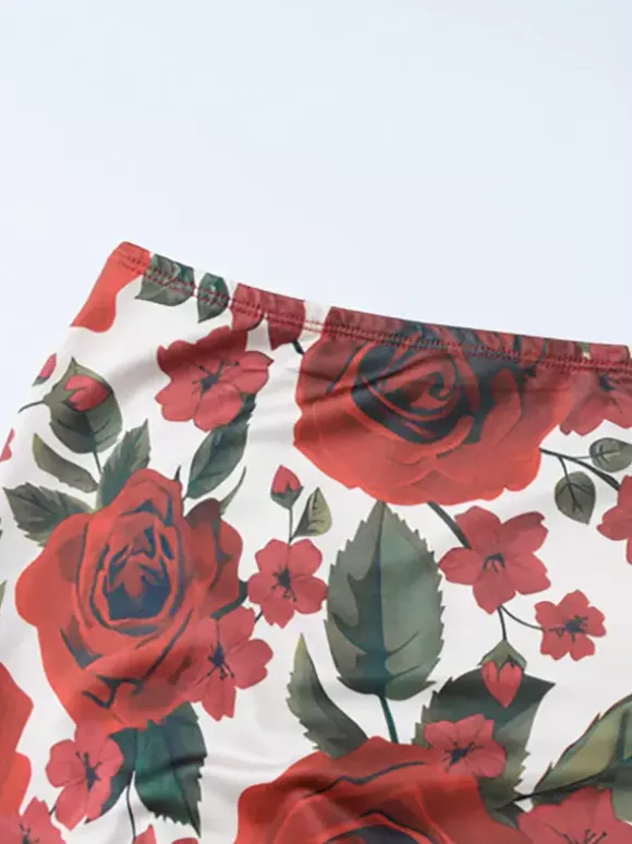 Ensemble deux pièces rouge sexy à imprimé floral tenue de villégiature en polyester à bretelles et col fleuri jupe sans manches.