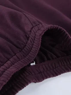 Ensemble athleisure pour femmes actives - Survêtement prune à capuche et fermeture éclair jambes larges - Collection printemps 2026 - Vêtements de yoga et de détente