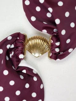 Ensemble de maillot de bain et cache-maillots bleu marine foncé sans manches.