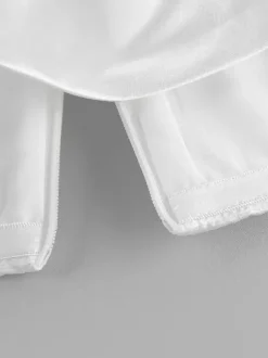 Ensemble deux pièces blanc chic en dentelle jupe sans manches sculptante style décontracté au quotidien.