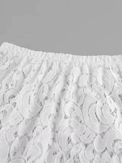 Ensemble deux pièces blanc chic en dentelle jupe sans manches sculptante style décontracté au quotidien.